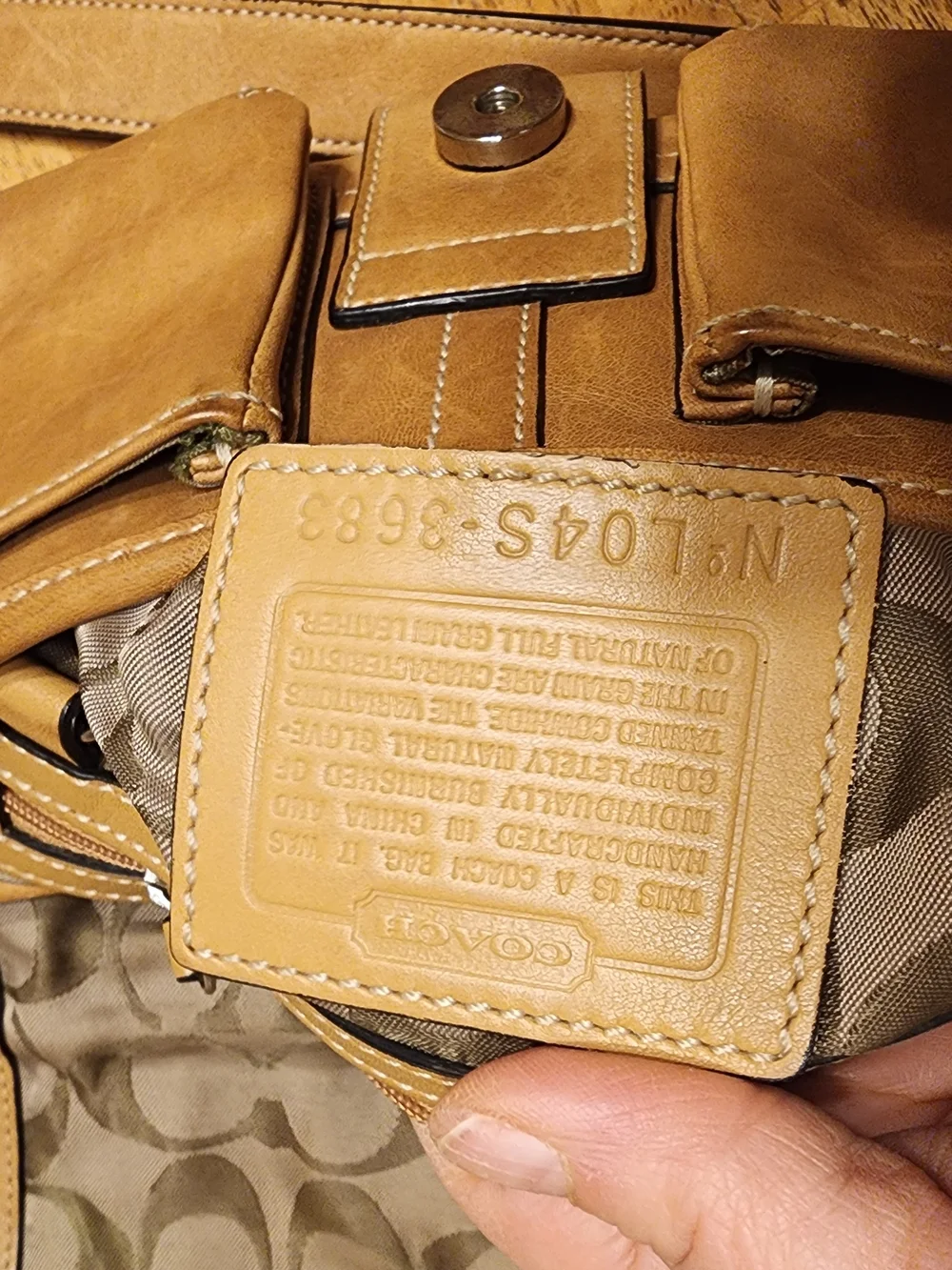 vintage 2004 Coach Soho shoulder bag in a tan or camel color